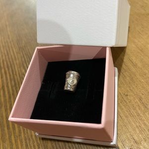 Authentic Pandora coffee to go charm. Silver and pink enamel.